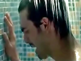 Fachri Albar strips in the shower in this forbidden scene from Banned Door (2010).