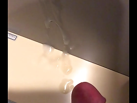 Japanese gay masturbates in public restroom and cums hard