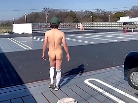Sissy Ma Yuchan naked and playing on the rooftop parking lot of a shopping center