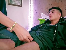 Skinny twink gets an incredible oil handjob from a big cock wielding boy