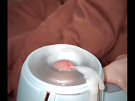 Asian man enjoys solo pleasure with a hammer stroker toy