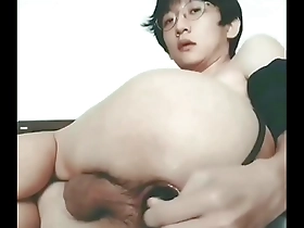 An Asian gay amateur shows off his hole and prolapse with a fist plug