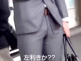 Gay Asian man in suit in amateur video