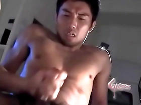 Gay Japanese muscle hunk in steamy video