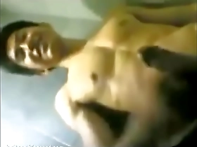 Asian gay masturbates with a smile on his face.