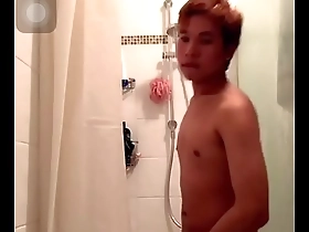 Young Asian boy washes up and gives a hint about his big dick