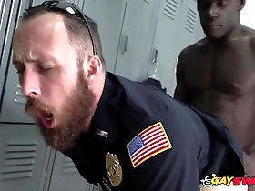 Gay police officers are seduced by a hot man who is released from prison.