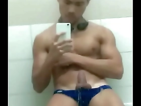 Hot Asian guy swims and masturbates in the pool