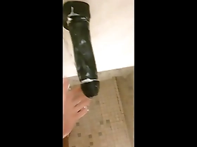 Public gym shower action with a large dildo